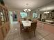 Dining room with table, chairs, and built-in hutch at 2609 Woodgate Ln # K4, Sarasota, FL 34231