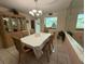 Dining room with table, chairs, and built-in hutch at 2609 Woodgate Ln # K4, Sarasota, FL 34231