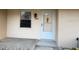 Condo entrance with light fixture and front door at 2609 Woodgate Ln # K4, Sarasota, FL 34231