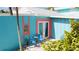 Beach cottage with turquoise and coral accents and patio at 2910 Gulf Dr # A, Holmes Beach, FL 34217