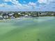 Beachfront property showcasing a charming house and beautiful water views at 308 S Bay Blvd, Anna Maria, FL 34216