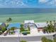 Aerial view of beachfront home and neighborhood at 308 S Bay Blvd, Anna Maria, FL 34216