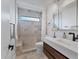 Clean bathroom with walk-in shower and modern vanity at 3321 Sheffield Cir, Sarasota, FL 34239