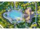 Community pool and clubhouse aerial view at 364 Palmaria Ct, Nokomis, FL 34275