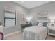 Small bedroom with twin bed, desk, and window seat at 364 Palmaria Ct, Nokomis, FL 34275