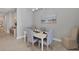 Dining room with white table and gray chairs at 364 Palmaria Ct, Nokomis, FL 34275