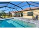 Spacious pool and patio with seating and home view at 364 Palmaria Ct, Nokomis, FL 34275