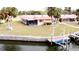 Aerial view of waterfront home with private dock at 4104 Catalina Dr, Bradenton, FL 34210