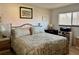 King-size bed, nightstands, and wood dresser in bedroom at 4104 Catalina Dr, Bradenton, FL 34210