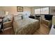 King-size bed, nightstands, and wood dresser in bedroom at 4104 Catalina Dr, Bradenton, FL 34210