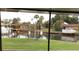 Scenic view of canal with boats from screened porch at 4104 Catalina Dr, Bradenton, FL 34210