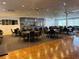 Large event room featuring tables, chairs, a dance floor, and a bar area at 4104 Catalina Dr, Bradenton, FL 34210