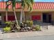 Landscaped entrance with a water feature and seasonal decor at the building's entrance at 4104 Catalina Dr, Bradenton, FL 34210
