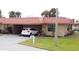 Single-story home with carport and manicured lawn at 4104 Catalina Dr, Bradenton, FL 34210