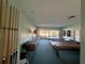 Spacious game room including shuffleboard, ping pong and dart board for leisure and entertainment at 4104 Catalina Dr, Bradenton, FL 34210