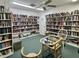 Community library filled with various books and seating area at 4104 Catalina Dr, Bradenton, FL 34210