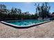 Inviting swimming pool with ample deck space for lounging at 4104 Catalina Dr, Bradenton, FL 34210