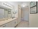 Bathroom with a single sink vanity and toilet at 4106 Central Sarasota Pkwy # 1026, Sarasota, FL 34238