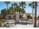 Picnic tables under shade structures on the beach at 4189 Roberts Point Cir, Sarasota, FL 34242