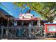 Outdoor bar with string lights and seating at 4189 Roberts Point Cir, Sarasota, FL 34242