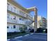 Condo building with stairs and parking at 4480 Ironwood Cir # 218A, Bradenton, FL 34209