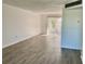 Spacious living room featuring wood-look floors at 4480 Ironwood Cir # 218A, Bradenton, FL 34209