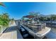 Pontoon boat at private dock on peaceful waterway at 4712 Compass Dr, Bradenton, FL 34208