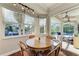 Breakfast nook with pool access and wicker chairs at 4712 Compass Dr, Bradenton, FL 34208
