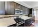 Kitchen with stainless steel appliances and white subway tile backsplash at 4712 Compass Dr, Bradenton, FL 34208