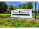Palmer Ranch community entrance sign with vibrant flowers at 5762 Benevento Dr, Sarasota, FL 34238