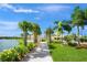 Quaint gazebo overlooking a serene lake at 5762 Benevento Dr, Sarasota, FL 34238