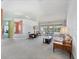 Spacious living room with a view to a lanai at 6001 Cedarwood Ln, Bradenton, FL 34203