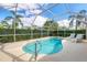 Inviting screened pool with lounge chairs and a sunny aspect at 6001 Cedarwood Ln, Bradenton, FL 34203