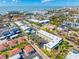Aerial perspective showcasing the building's layout and beach proximity at 6703 Midnight Pass Rd # 117, Sarasota, FL 34242