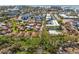 Aerial view of the property and its proximity to the ocean at 6703 Midnight Pass Rd # 117, Sarasota, FL 34242