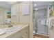 Clean bathroom with a single sink and shower at 6703 Midnight Pass Rd # 117, Sarasota, FL 34242