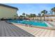 Inviting community pool area with surrounding patio at 6703 Midnight Pass Rd # 117, Sarasota, FL 34242