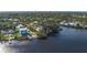 Aerial view showing home's waterfront location at 703 32Nd Street E Ct, Bradenton, FL 34208