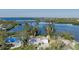 Aerial view of home and surrounding waterways at 703 32Nd Street E Ct, Bradenton, FL 34208