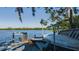 Rustic dock with a small boat at 703 32Nd Street E Ct, Bradenton, FL 34208