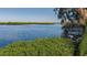 Waterfront view with old dock and mangroves at 703 32Nd Street E Ct, Bradenton, FL 34208