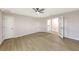 Spacious bedroom with hardwood floors and access to a private balcony at 7800 18Th W Ave, Bradenton, FL 34209