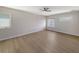 Bright bedroom with wood-look floors and large windows at 7800 18Th W Ave, Bradenton, FL 34209