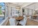 Charming breakfast nook with a round wooden table and light-filled space at 7800 18Th W Ave, Bradenton, FL 34209