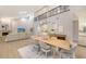 Open and airy dining room with high ceilings and modern light fixture at 7800 18Th W Ave, Bradenton, FL 34209
