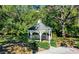 White gazebo in a garden setting at 7800 18Th W Ave, Bradenton, FL 34209