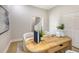 Home office with a wooden desk and access to a staircase at 7800 18Th W Ave, Bradenton, FL 34209