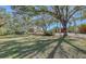Brick house nestled amongst trees at 7800 18Th W Ave, Bradenton, FL 34209