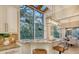 Modern kitchen with breakfast bar and large windows overlooking the backyard at 7800 18Th W Ave, Bradenton, FL 34209
