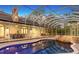 Inviting pool and spa with a screened enclosure at 7800 18Th W Ave, Bradenton, FL 34209
